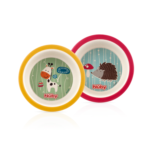 The Nuby Bamboo and Cornstarch Feeding Bowl 2 Pack includes two biodegradable bowls for toddlers, each with a colorful rim—one yellow with a giraffe, one pink with a hedgehog and mushroom. Both feature the Nuby logo, perfect for eco-friendly mealtimes.