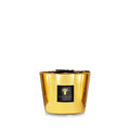 A collection of gold colored candles with glass containers, each with a label reading 'Baobab'.