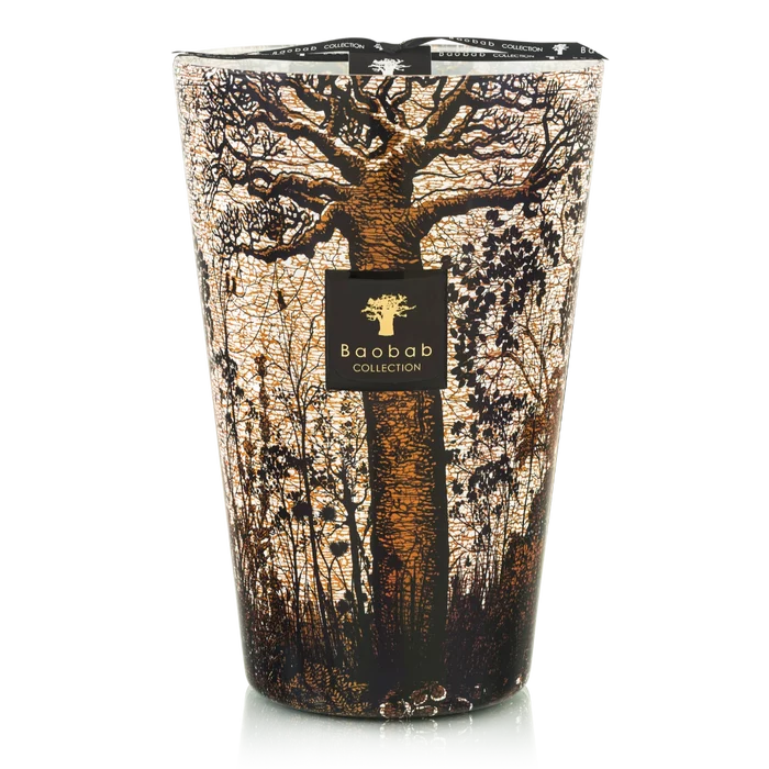 Decorative candle with tree design and Baobab Collection logo on a white background