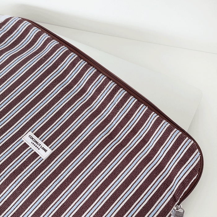 Brown, white and blue striped Laptop Sleeve with silver zip and Coconut Lane logo badge.