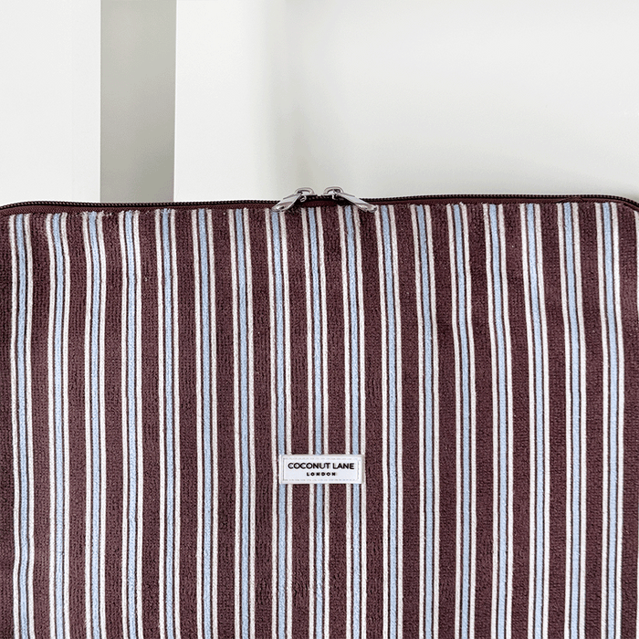 Brown, white and blue striped Laptop Sleeve with silver zip and Coconut Lane logo badge.