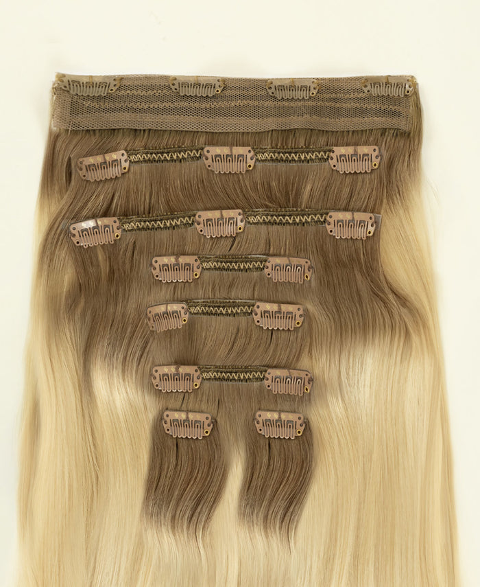 clip-in hair extensions rooted blonde.