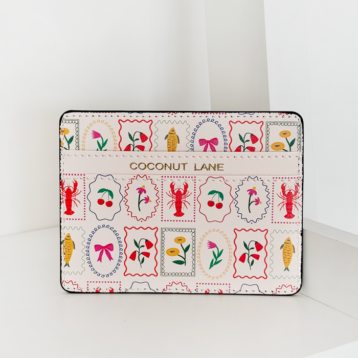 Dolce Vita card holder in vegan leather with colorful lobster, cherry, and bow pattern by Coconut Lane.