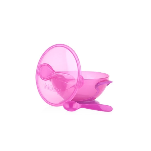 The Easy Go Suction Bowl & Spoon Travel Set includes a translucent pink baby bowl with handles, a matching lid, and spoon—perfect for feeding babies or toddlers. The suction base keeps it in place, and it's dishwasher safe for easy cleaning.