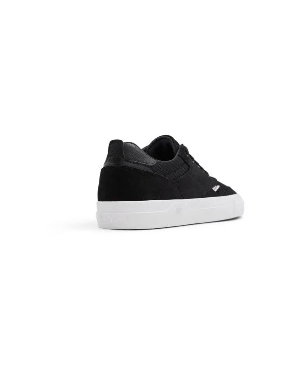 Black slip-on sneaker with white sole on a white background