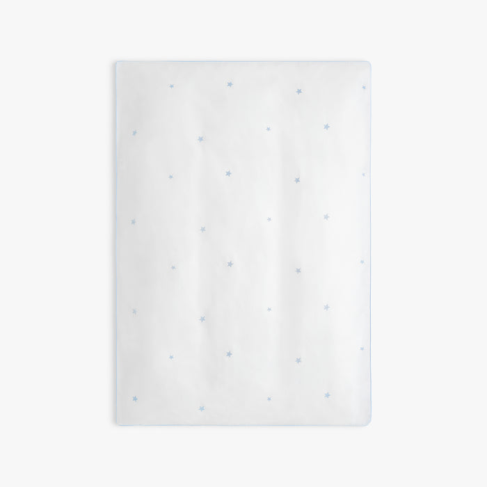 White baby duvet with blue stars embroidery on a while background