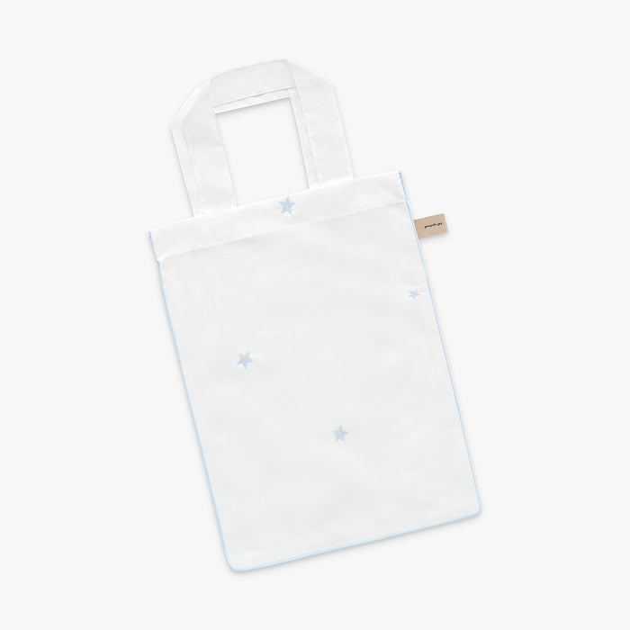 White tote bag with embroidered blue stars on a white background
