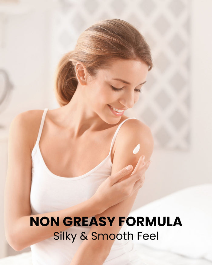 Woman applying lotion to hands, silky smooth feel