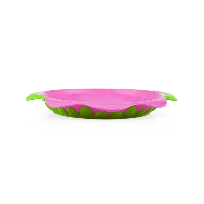 The Flower Child Plate is a pink, round toddler plate with green leaf-shaped handles and a green leaf pattern at the base, ideal for mealtime or as a stylish feeding accessory, displayed on a white background.