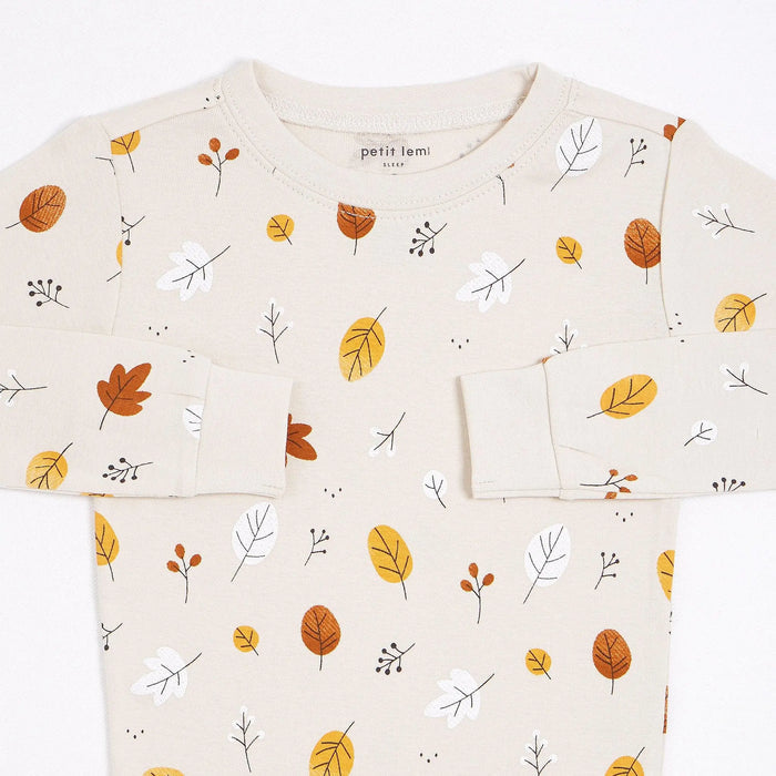 Close-up of Petit Lem girls Foliage print pajamas with organic cotton rib and ribbed cuffs.