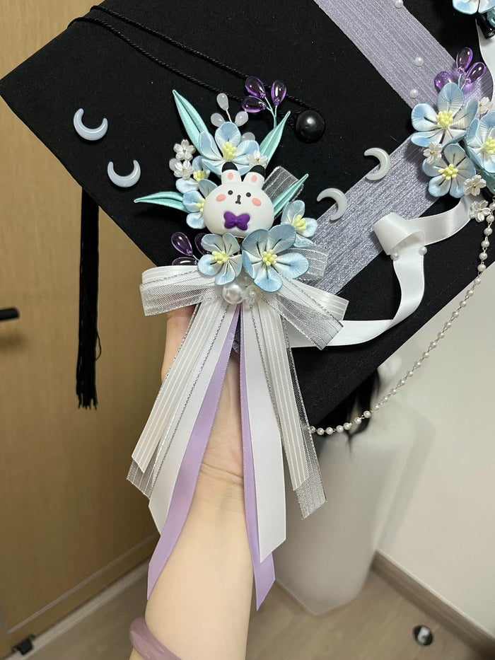 Handmade Chanhua - decorated graduation cap with a cute bunny and floral elements