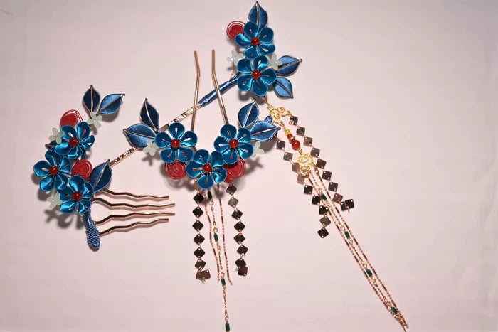 A woman wearing a handmade Chanhua imitation Diancui hair set with colorful flowers and tassels-3