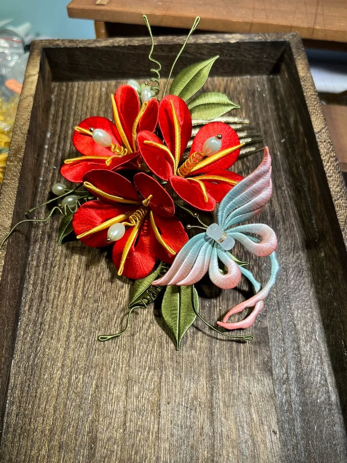 A handmade Chanhua morning glory hairpin with pink flowers and blue - green leaves on a wooden tray-4