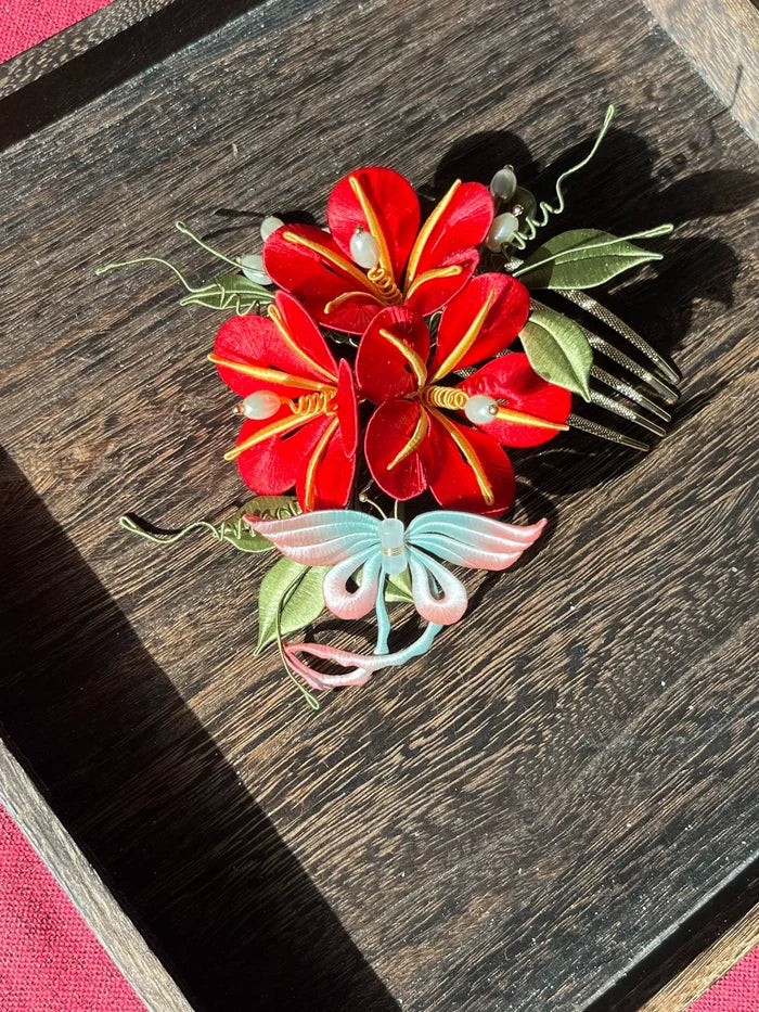 A handmade Chanhua morning glory hairpin with pink flowers and blue - green leaves on a wooden tray-5