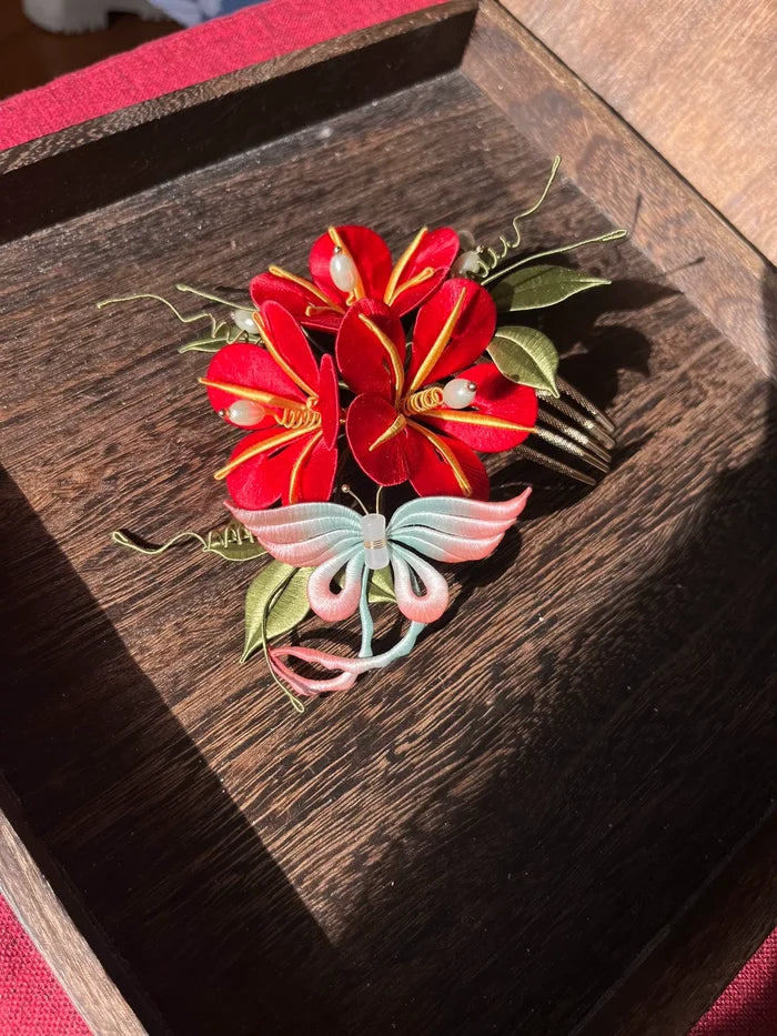 A handmade Chanhua morning glory hairpin with pink flowers and blue - green leaves on a wooden tray-6