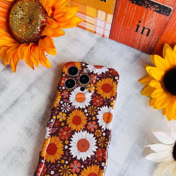 Harvest Sunflowers Wavy Luxe MagSafe Case for iPhone â Harvest Sunflowers Bring golden-hour glow to your phone with the Harvest Sunflowers Wavy Luxe MagSafe Case.