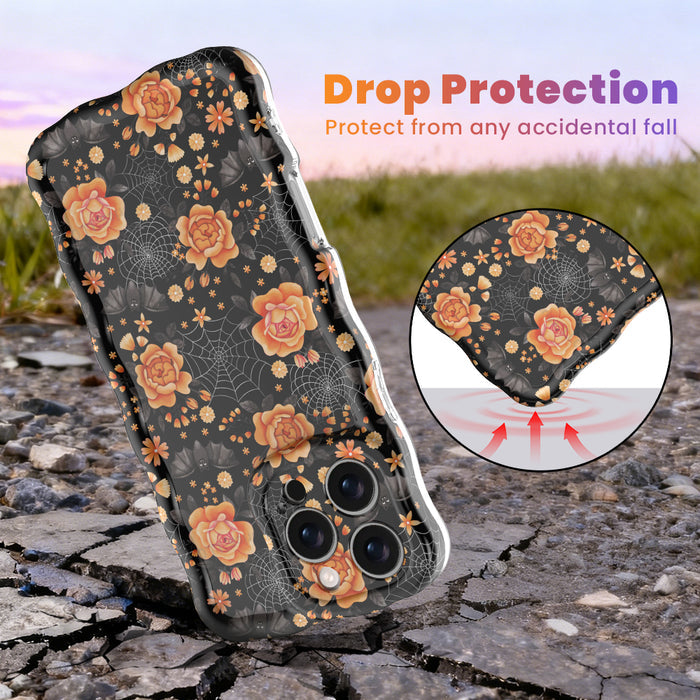 Drop protection diagram for the Haunted Blossoms Wavy Luxe MagSafe iPhone case, with a close-up of the cushioned corner.