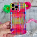 Hazy Tartan Wavy Luxe MagSafe Case for iPhone — The hazy tartan design blends hot pink, lime green, purple, yellow, and orange in a mesmerizing pattern.