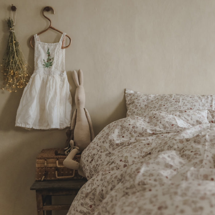 Twin duvet sheet set in the "Into The Woodlands" print in the color ivory, the set includes a duvet cover and a standard pillowcase