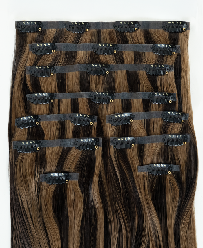 invisible clip-in hair extensions dark highlights.