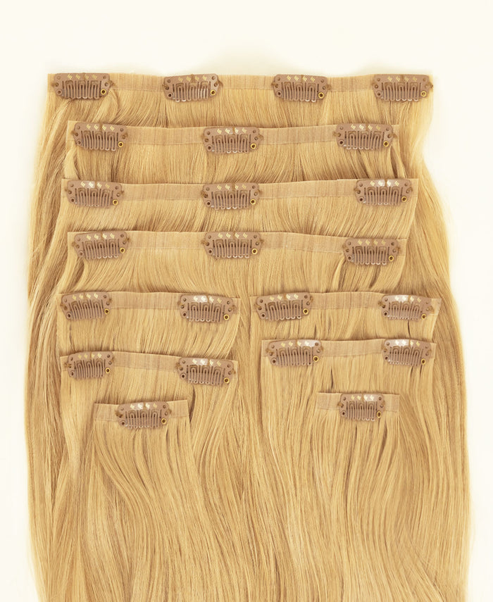invisible clip-in hair extensions honey blonde.