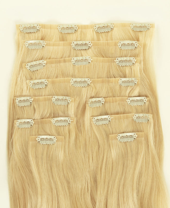 invisible clip-in hair extensions light blonde.