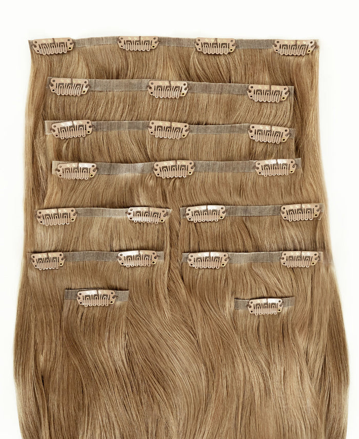 invisible clip-in hair extensions medium blonde.