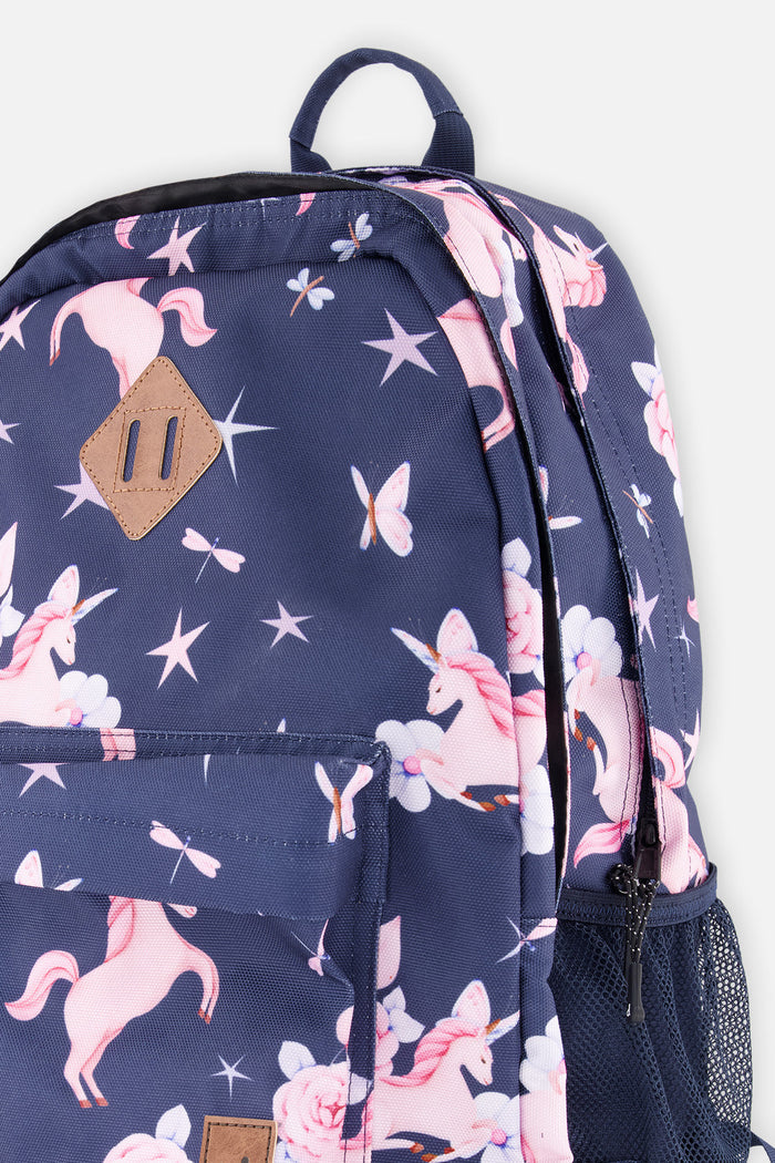Side detail of Deux par Deux kids backpack with unicorn print, zipper compartments, and pocket design.