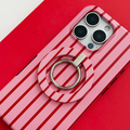 Coconut Lane MAGSAFE® Phone Ring in Cherry Stripes pattern beside a matching striped phone case on a red and white surface.
