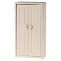 A small toy closet in a cream color with two doors and three golden hangers inside.