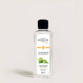 Bottle of Maison Berger lamp refill on a light background