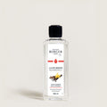 Bottle of Maison Berger refill on a light gray background
