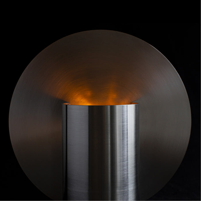 BeCandle x The Grey Green Vase Candle 400g lit, scented soy candle burning in stainless steel vessel with warm glow.