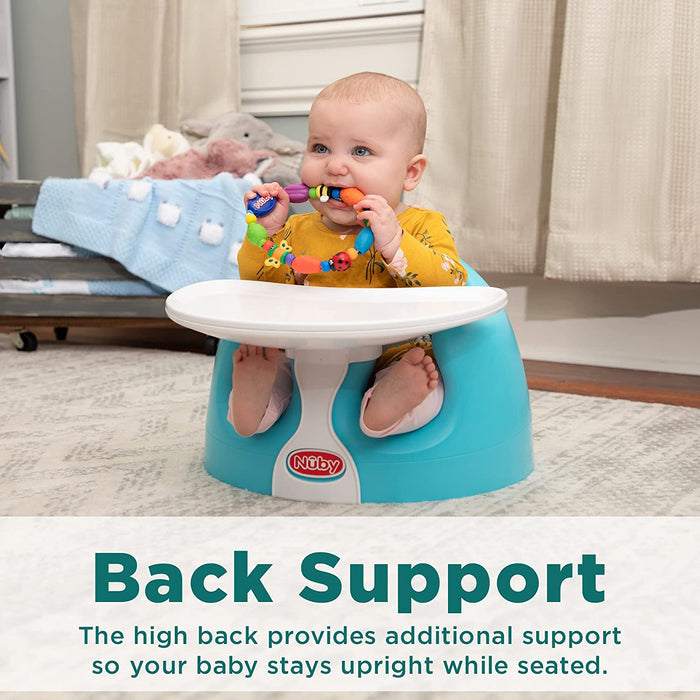 A baby sits upright in the blue My Floor Seat with white tray, holding colorful teething toys. A gray rug, basket, and blanket are visible. Text: Back Support. My Floor Seat’s high back keeps your baby comfortably upright while seated.