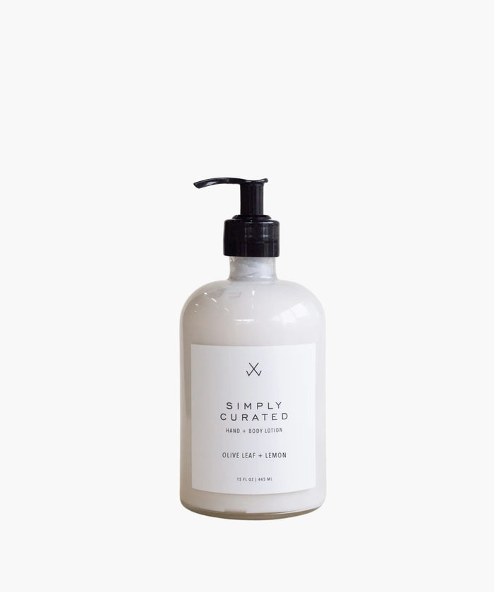 White lotion bottle with pump and 'Simply Curated' label on a white background. | SW Home
