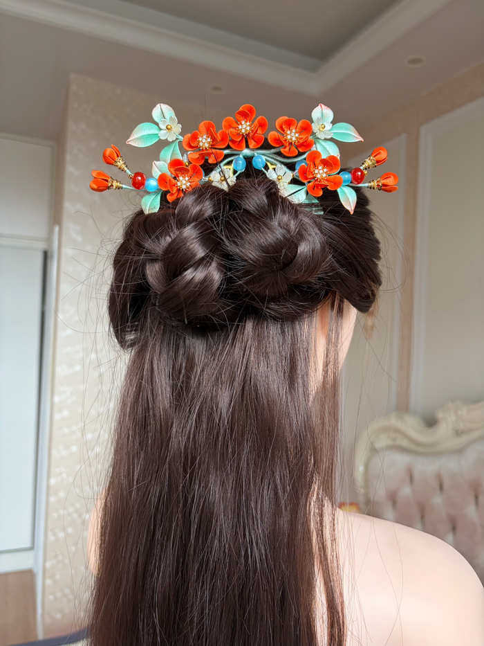 Orange - colored handmade Chanhua hair comb on a woman's hair-2