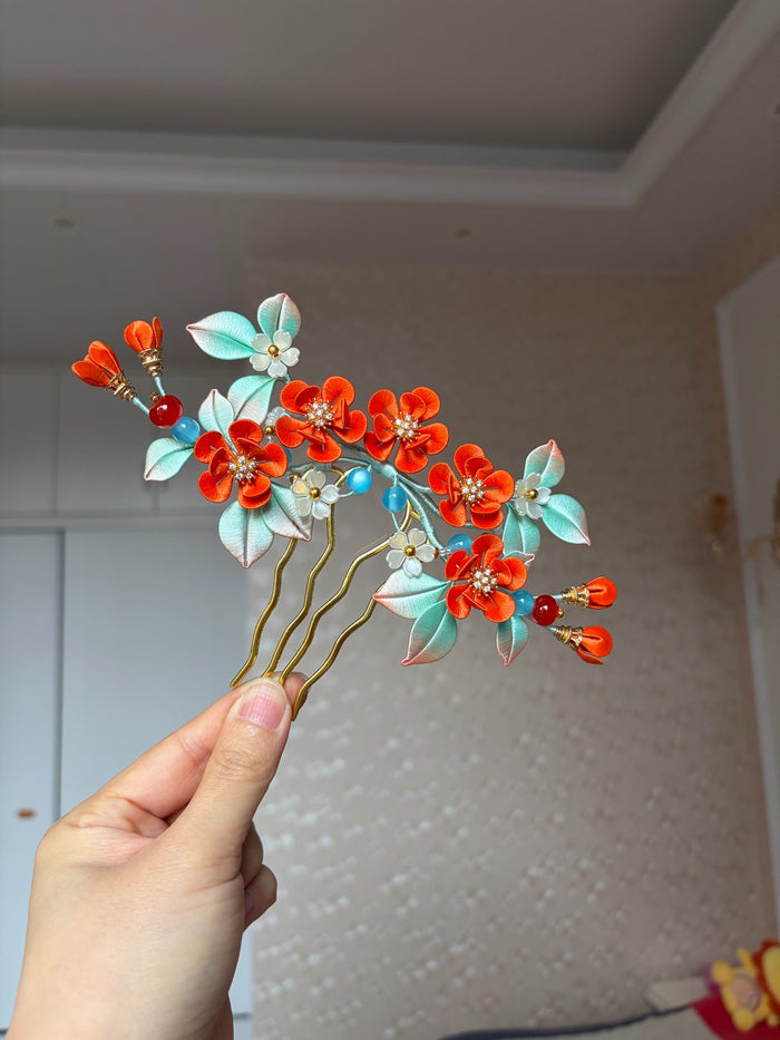 Orange - colored handmade Chanhua hair comb on a woman's hair-3