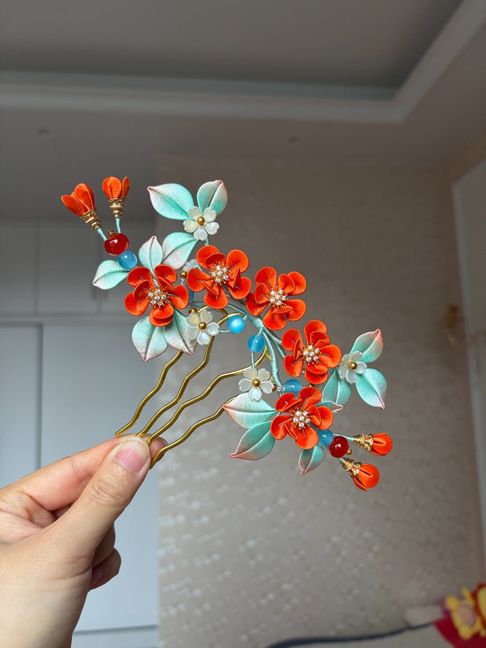 Orange - colored handmade Chanhua hair comb on a woman's hair-4