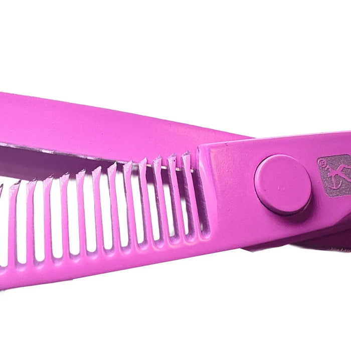 Close-up of a bright pink hair combing tool with a comb-like front edge and a circular pivot screw, shown on a plain white background.