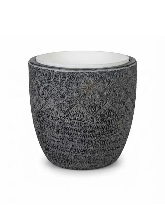 Round dark gray patterned planter with light top insert and textured surface