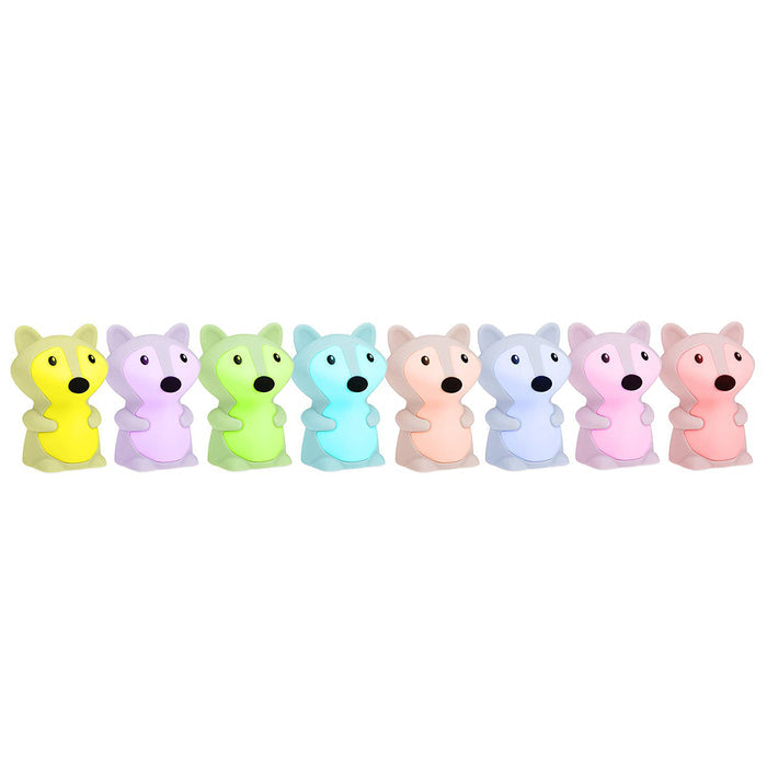 Eight pastel-colored Silicone Nightlights in the shape of foxes are arranged in a row. Each features a unique color: yellow, light purple, lime green, mint green, blue, peach, lavender, and pink—ideal for kids' rooms.