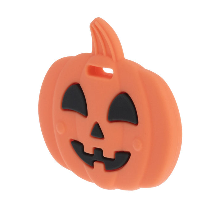 The Nuby Silicone Pumpkin Teether is an orange keychain shaped like a smiling jack-o-lantern with black features—perfect as a festive Halloween pumpkin teether or fun accessory.
