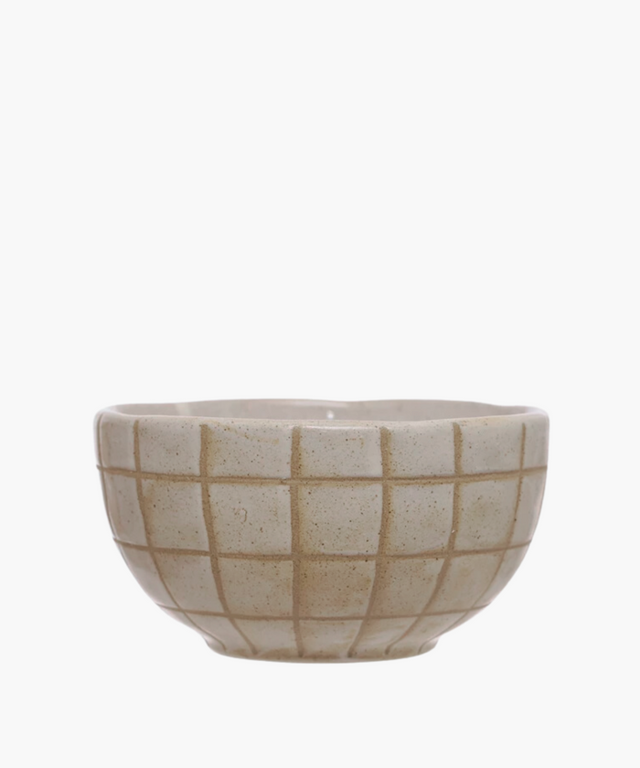 A beige stoneware bowl with a debossed geometric grid pattern and a light glaze. | Wildwood Home Co.