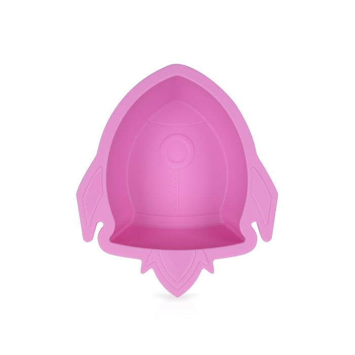 The Sure Grip Rocket Suction Bowl is a pink, non-slip silicone bowl shaped like a rocket ship, shown from above on a white background—ideal for baby self-feeding.