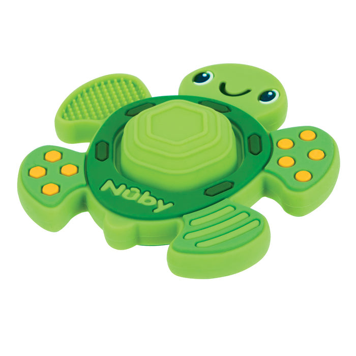 The Teethe N' Pop Sensory Play Teether | Turtle is a green, turtle-shaped baby teether with a smiling face, yellow spots, textured flippers, and layered soft shell ridges for sensory play. "Nuby" is printed on one flipper.