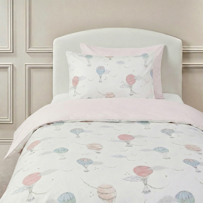 Twin duvet sheet set in the "Touch The Sky" print in the color pink, the set includes a duvet cover and a standard pillowcase