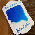 Troublemaker Blue Guitar Ink