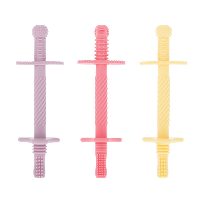 Nuby’s Tube Teethers (3 Pack) in purple, pink, and yellow stand upright on a white background. Each teether features cross-guards and a ribbed surface for easy grip, making them perfect for soothing little gums.